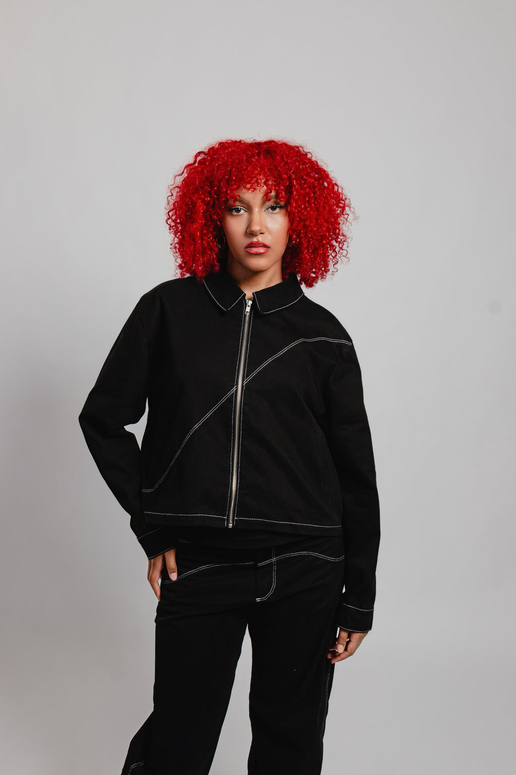 VESTE COURTE SURPIQURES