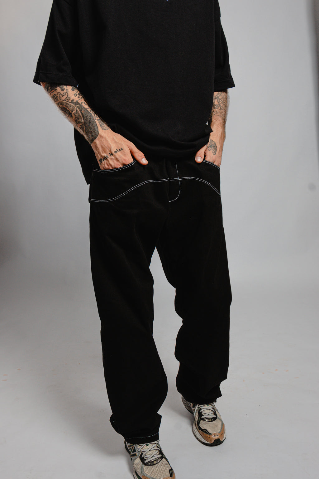 PANTALON NOIR SURPIQURES TAILLE BASSE