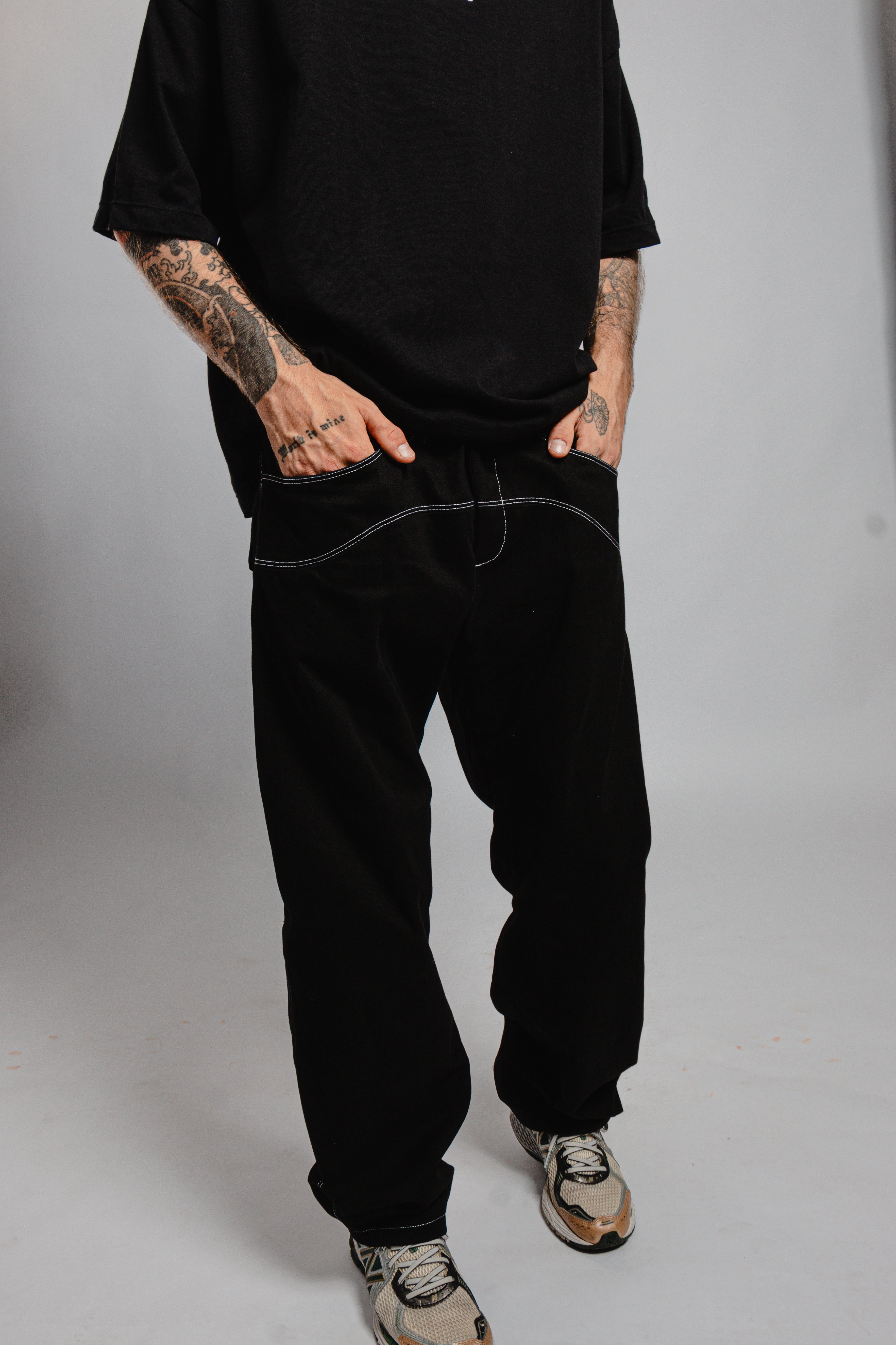 PANTALON NOIR SURPIQURES TAILLE BASSE