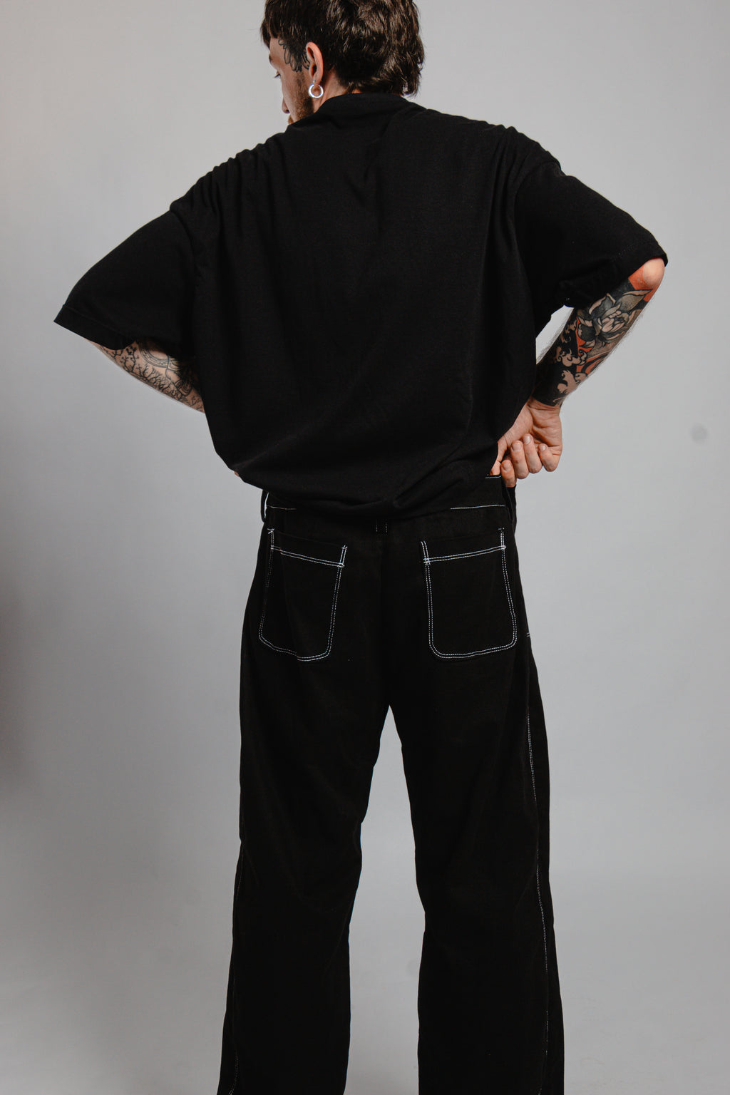 PANTALON NOIR SURPIQURES TAILLE BASSE