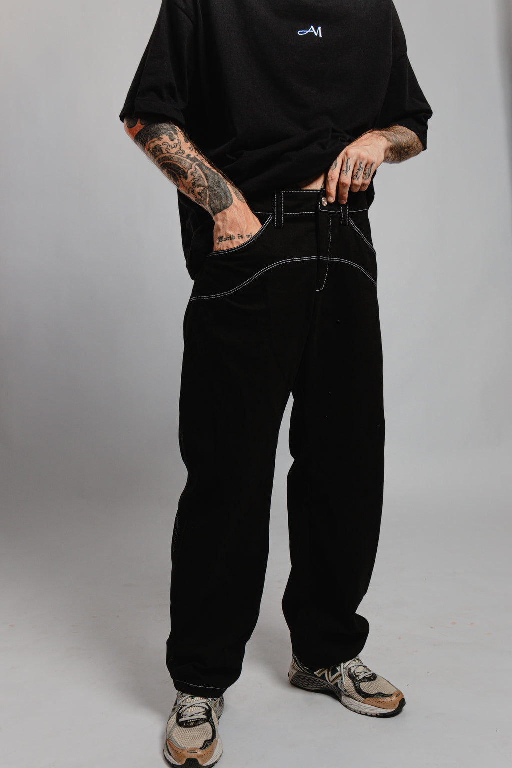 PANTALON NOIR SURPIQURES TAILLE BASSE