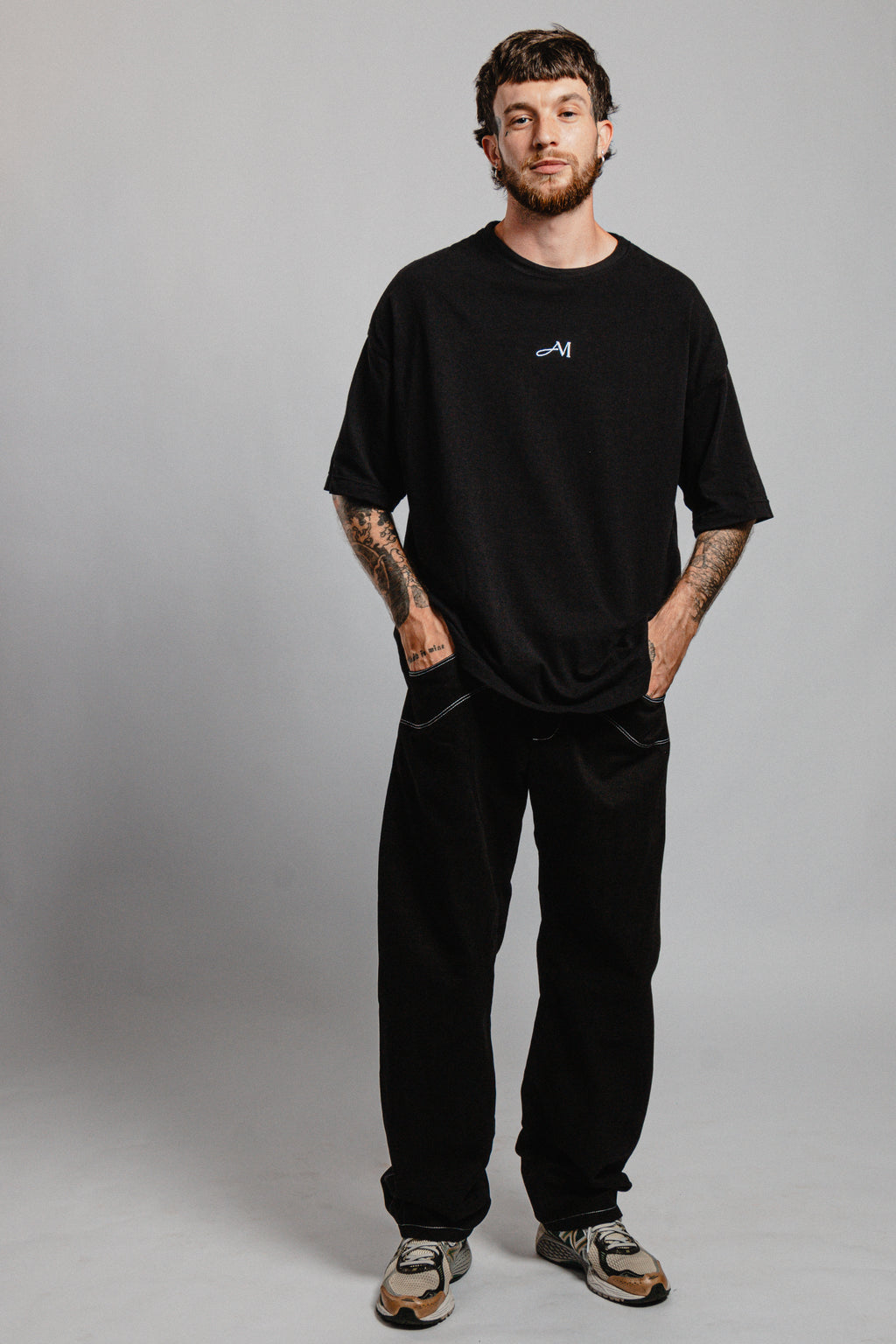 PANTALON NOIR SURPIQURES TAILLE BASSE