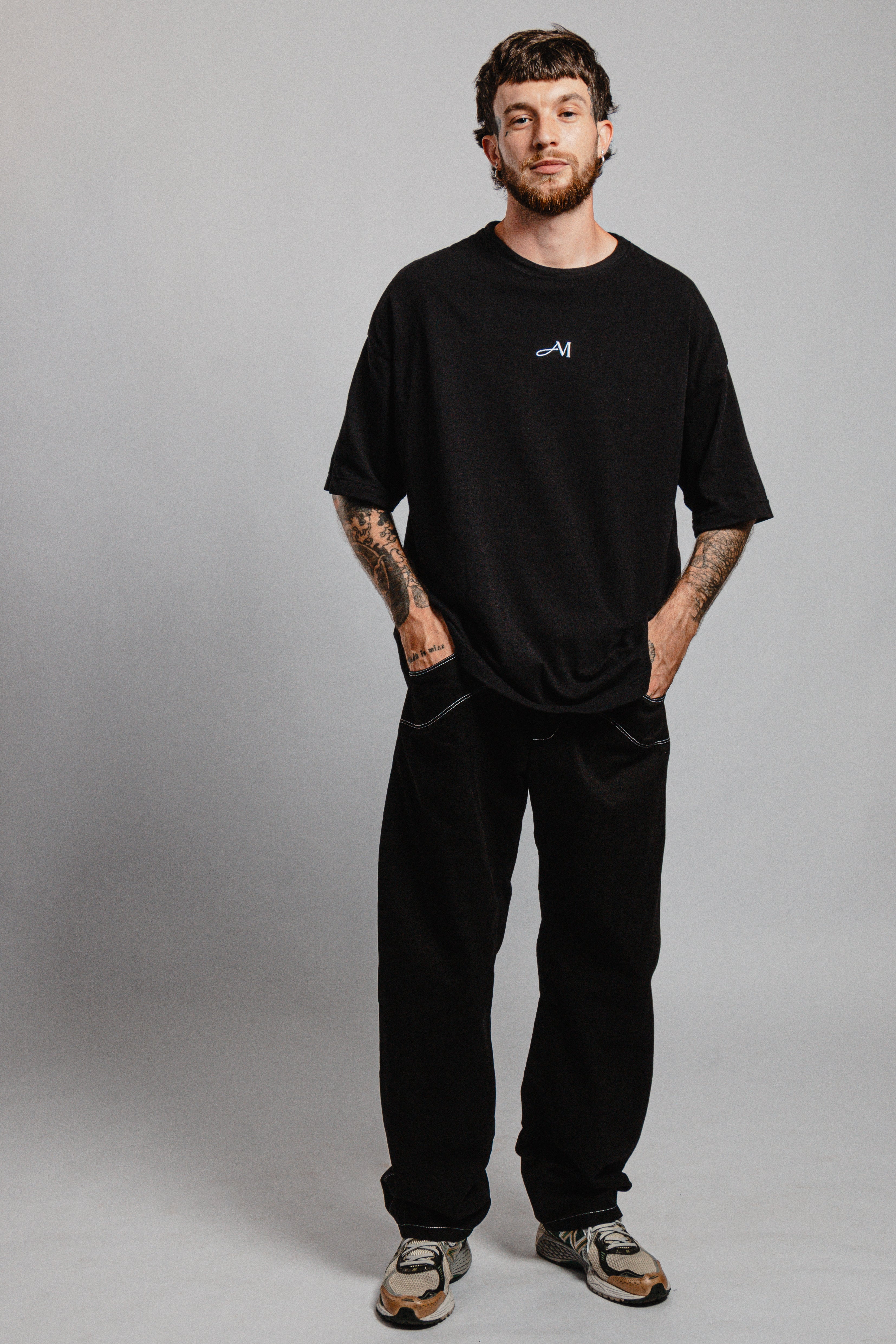 PANTALON NOIR SURPIQURES TAILLE BASSE